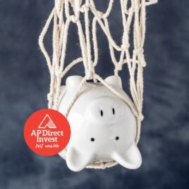 Piggy bank trapped in a net – Representing financial advice on avoiding financial pitfalls Piggy bank trapped in a net – Representing financial advice on avoiding financial pitfalls