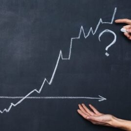 Chalkboard with an increasing financial graph and a question mark – Financial advice on market trends, investments, and wealth-building strategies Chalkboard with an increasing financial graph and a question mark – Financial advice on market trends, investments, and wealth-building strategies