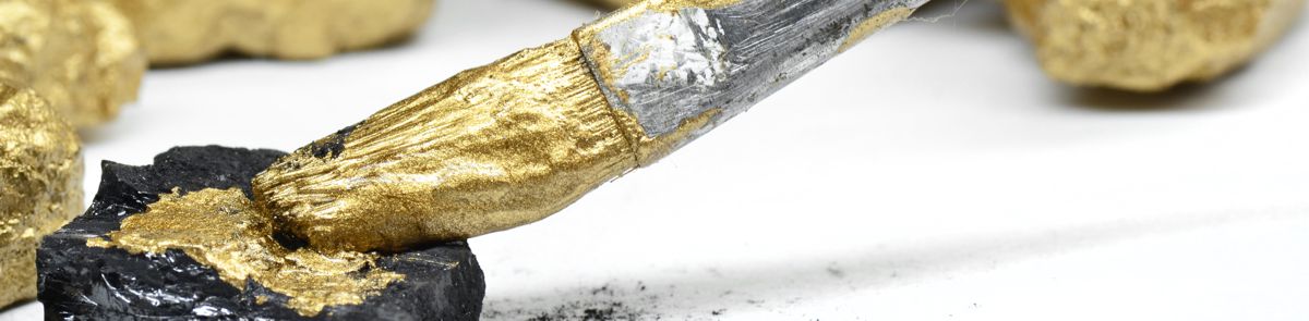 Painting Rock in Gold Color at Alman Partners True Wealth